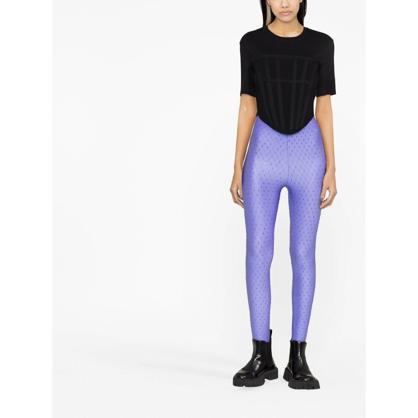 Lilac high-waisted skinny rhinestone embellished leggings by THE ANDAMANE, styled with a black top and boots.