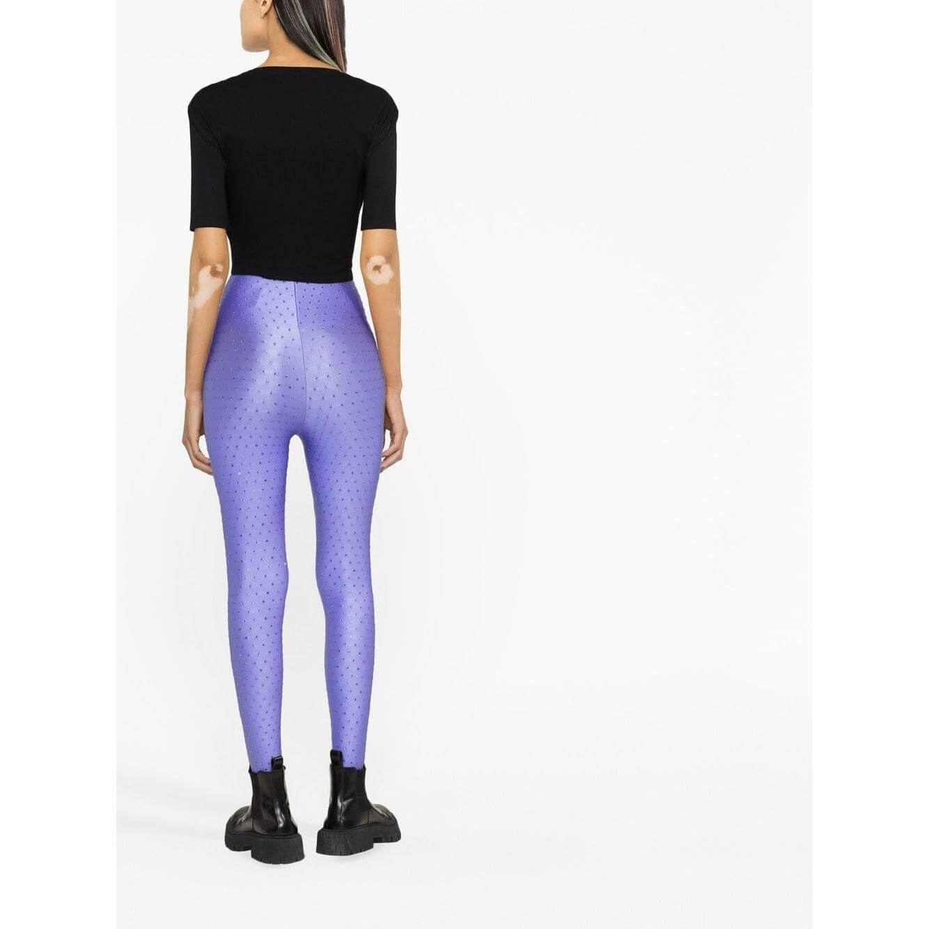 Model wearing THE ANDAMANE lilac rhinestone leggings, high-waisted, skinny fit, stretch-design back view.