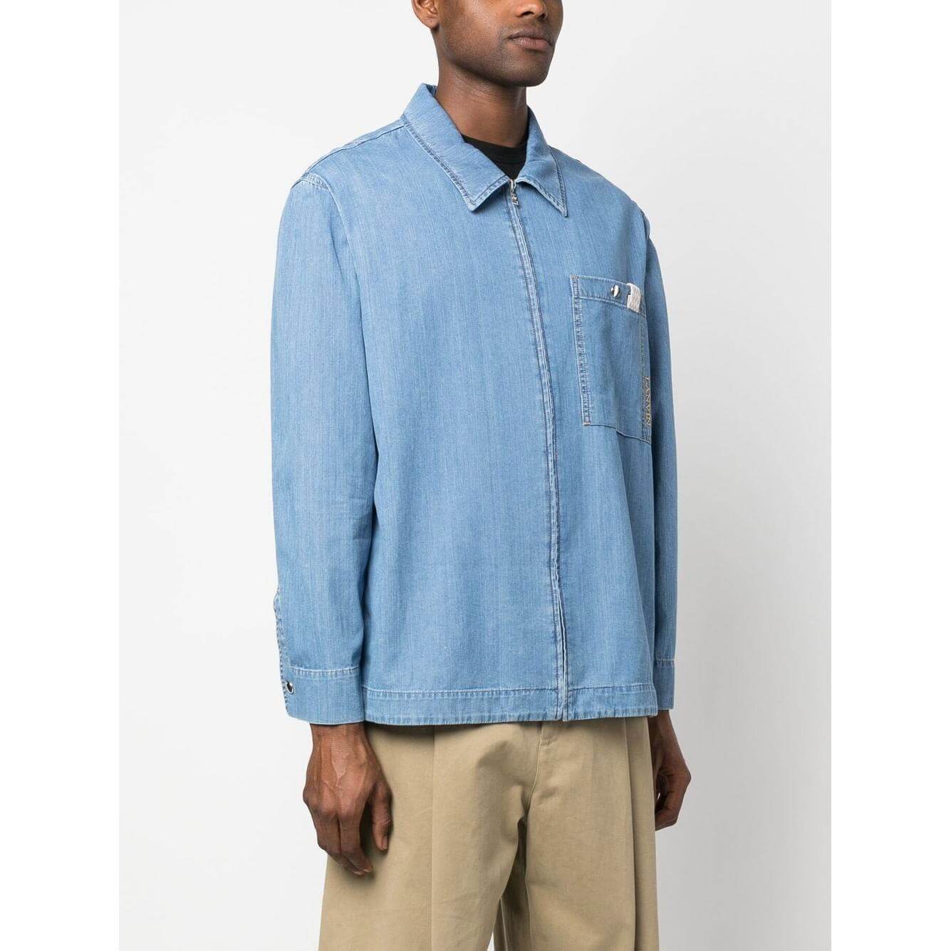 Lanvin light blue denim shirt with embroidered logo, zip-up front, classic collar, long sleeves, and a front patch pocket.