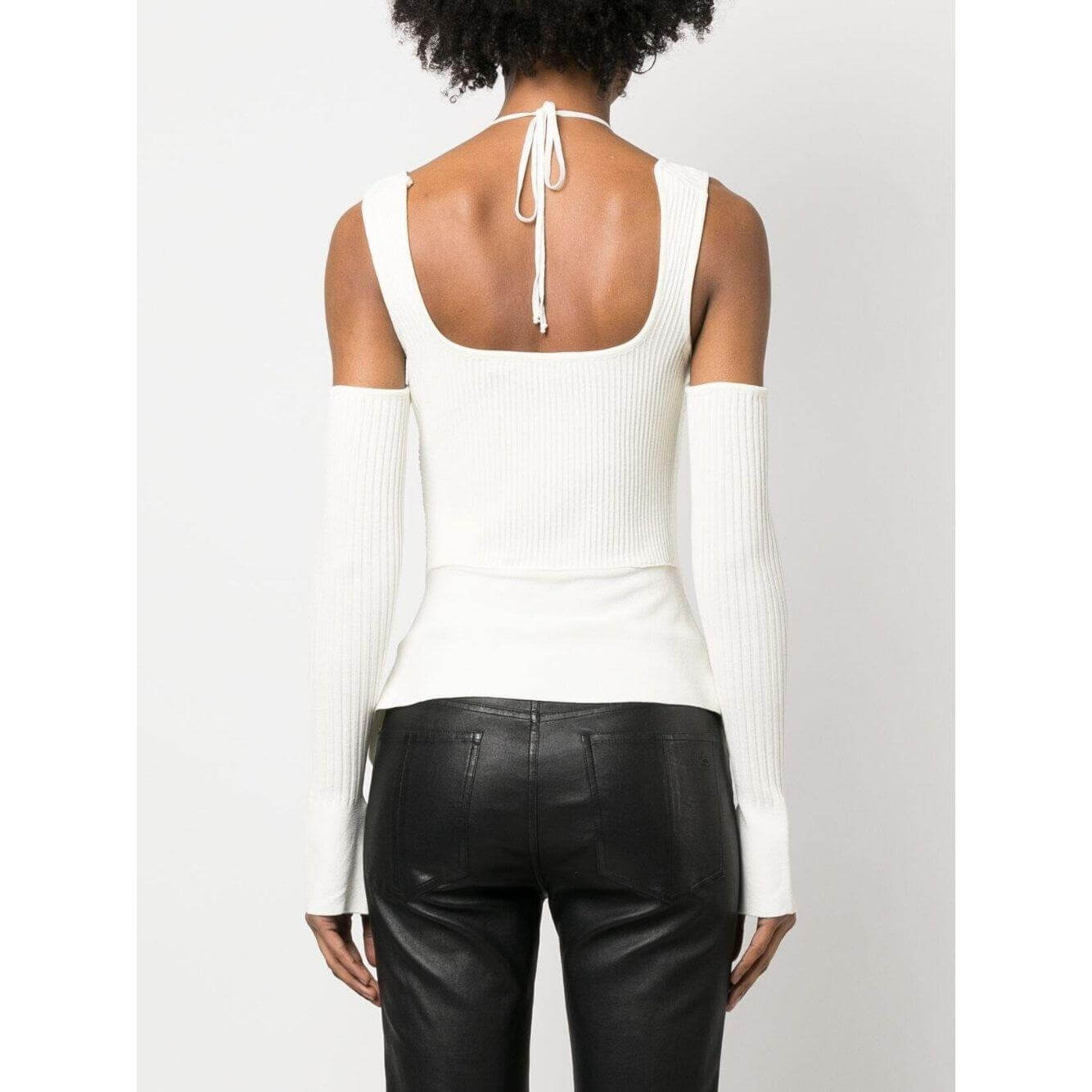 Andrea Adamo ivory white ribbed knit top with cut-out details, wide shoulder straps, and halterneck tie, back view.