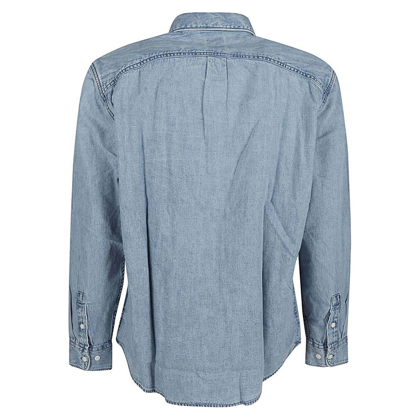 Lee Clear Blue denim shirt back view, medium-large size, features chest pocket with logo, true to size fit, model height 6ft 1in.