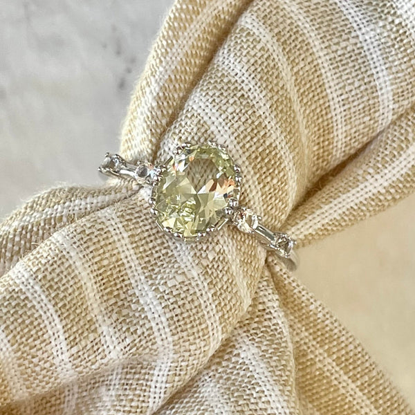 24KAE JEWELS JEWELRY Mod. 12406S/58 ring with gemstone on fabric background