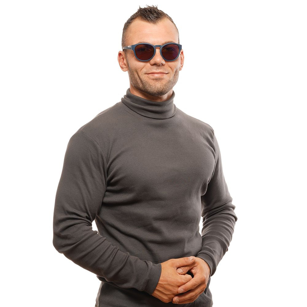 Man wearing Bolle blue unisex sunglasses with round mirrored lenses and plastic frame.