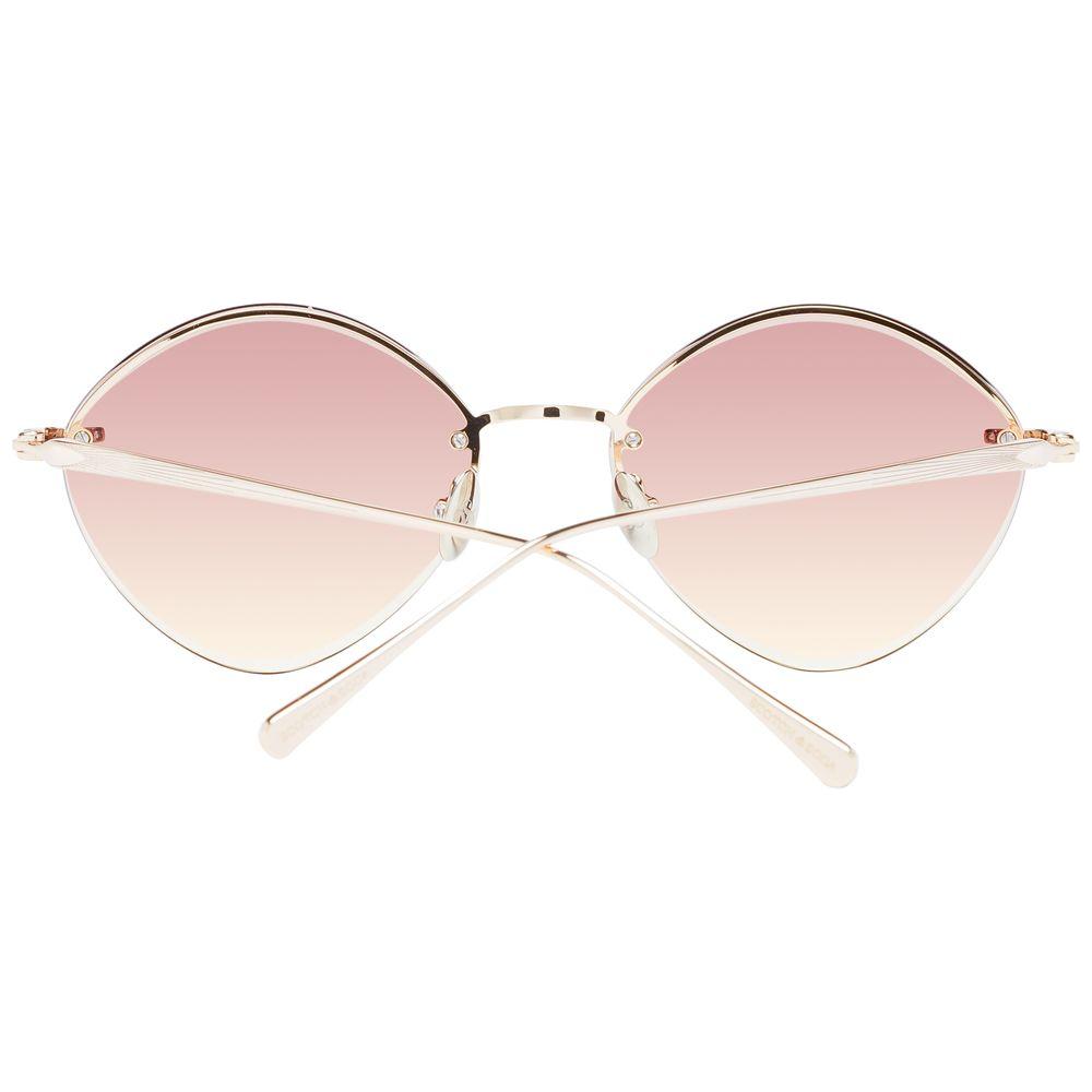 Scotch & Soda gold rimless oval sunglasses for women, stainless steel frame, brown lenses, 100% UVA & UVB protection.