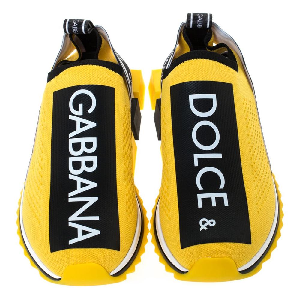 Dolce & Gabbana yellow stretch sneakers with logo print, featuring durable rubber soles, crafted in Italy for stylish comfort.