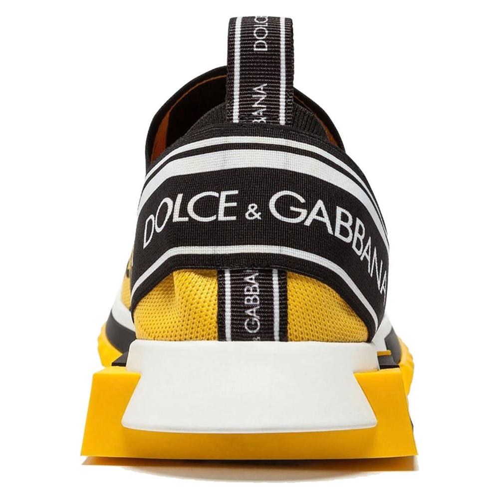 Dolce & Gabbana yellow logo-print sneakers with stretch design and logo strap, featuring durable rubber sole for style and comfort.