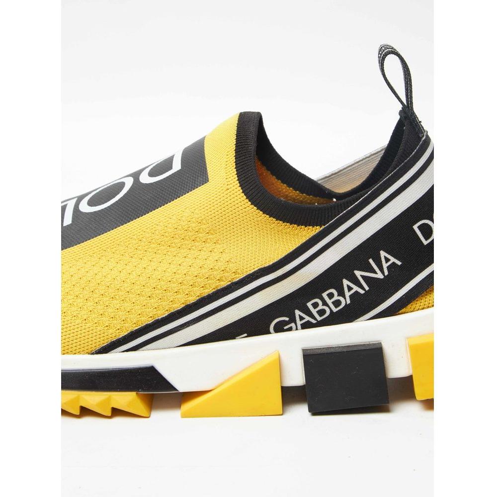 Dolce & Gabbana yellow logo-print stretch sneakers with rubber soles, showcasing luxury and style.