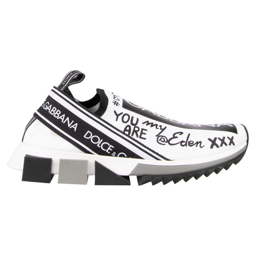 Dolce & Gabbana monochrome printed stretch sneaker with square-cut rubber sole, featuring black and white script detailing, side view.