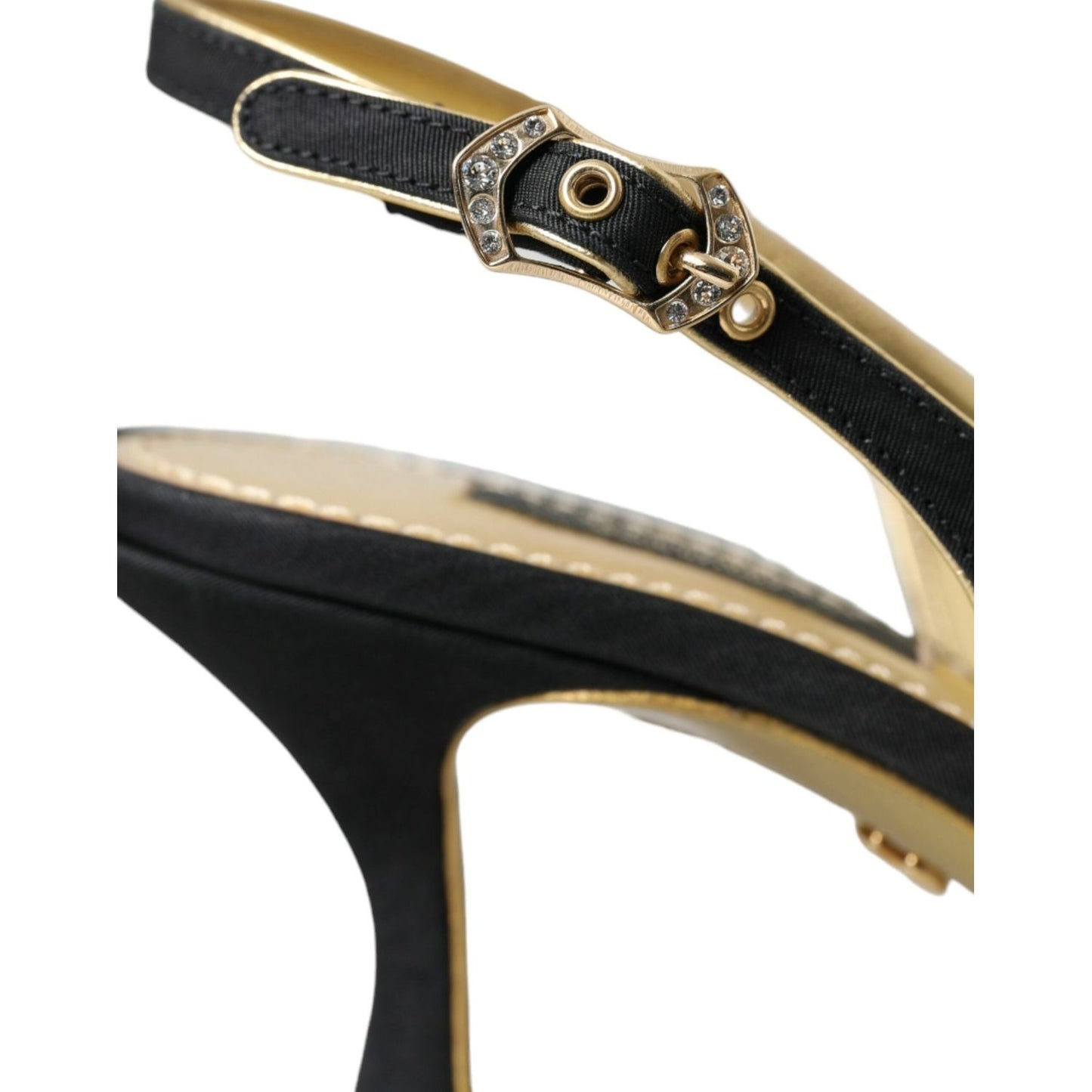 Close-up of Dolce & Gabbana black suede slingback heels with gold buckle and faux pearls, made in Italy.