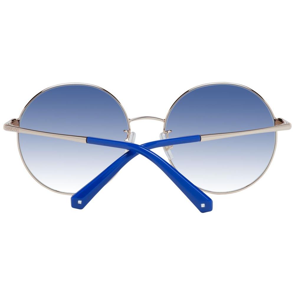 Round Swarovski rose gold women's sunglasses with gradient blue lenses and metal frame.