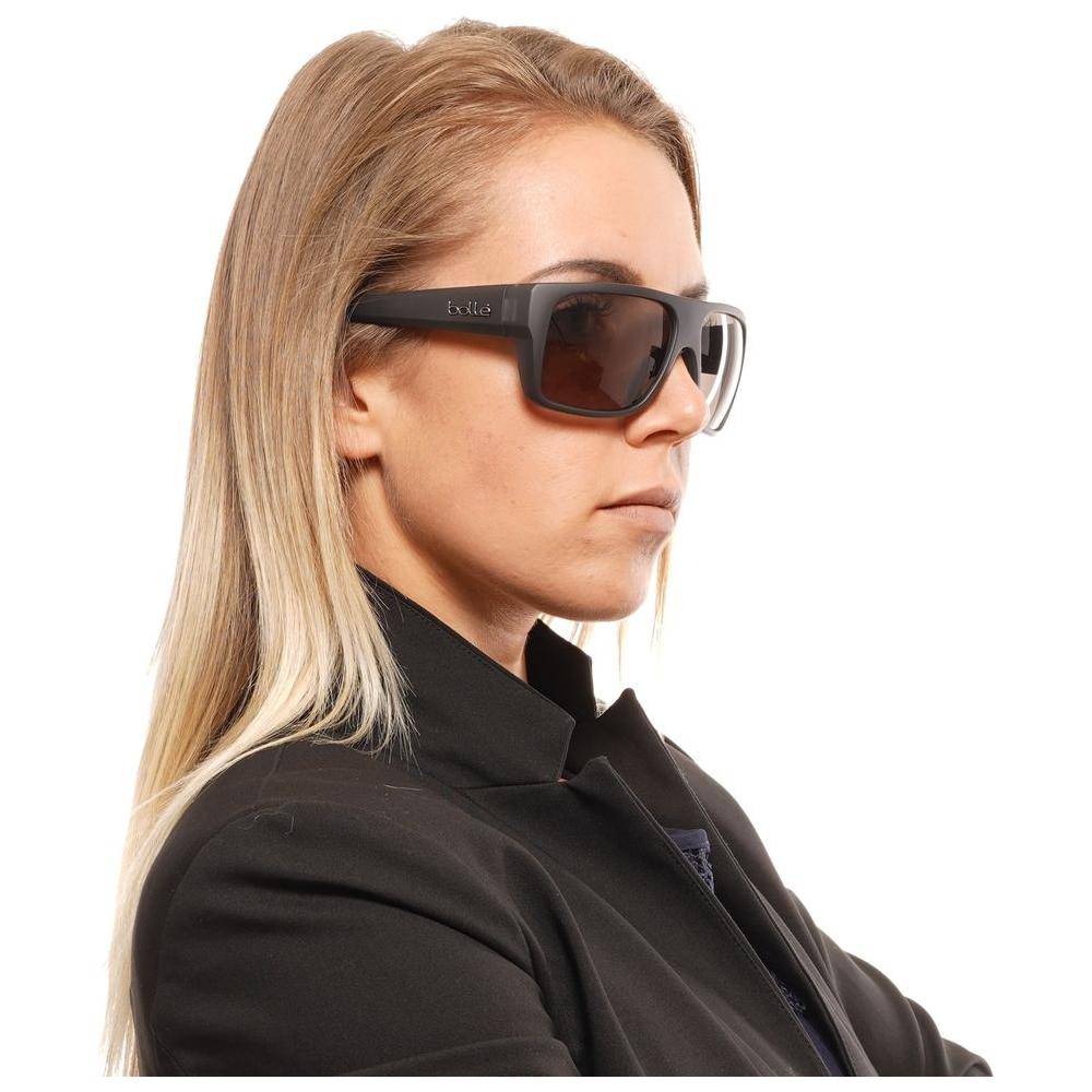 Bolle black unisex sunglasses with polarized grey lenses and full-rim plastic frame, worn by person.