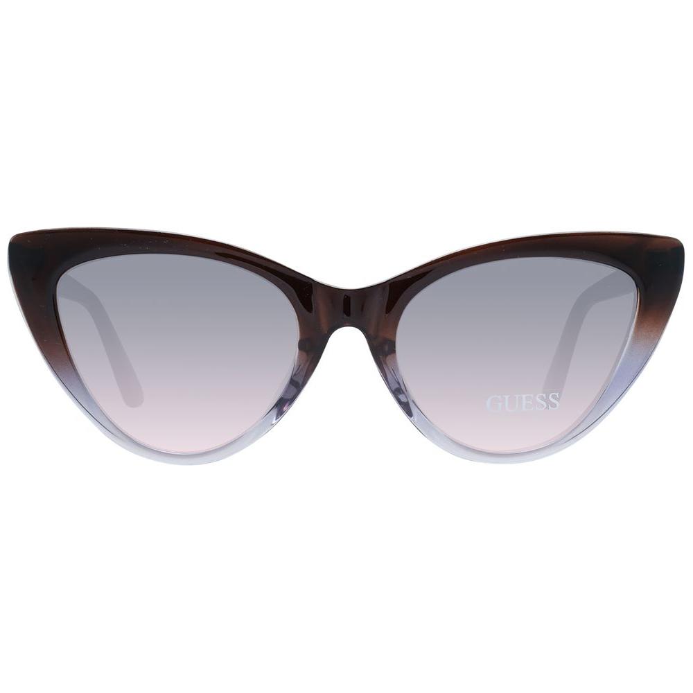 Guess brown cat eye women's sunglasses with purple gradient lenses and full-rim plastic frame, 100% UVA & UVB protection.