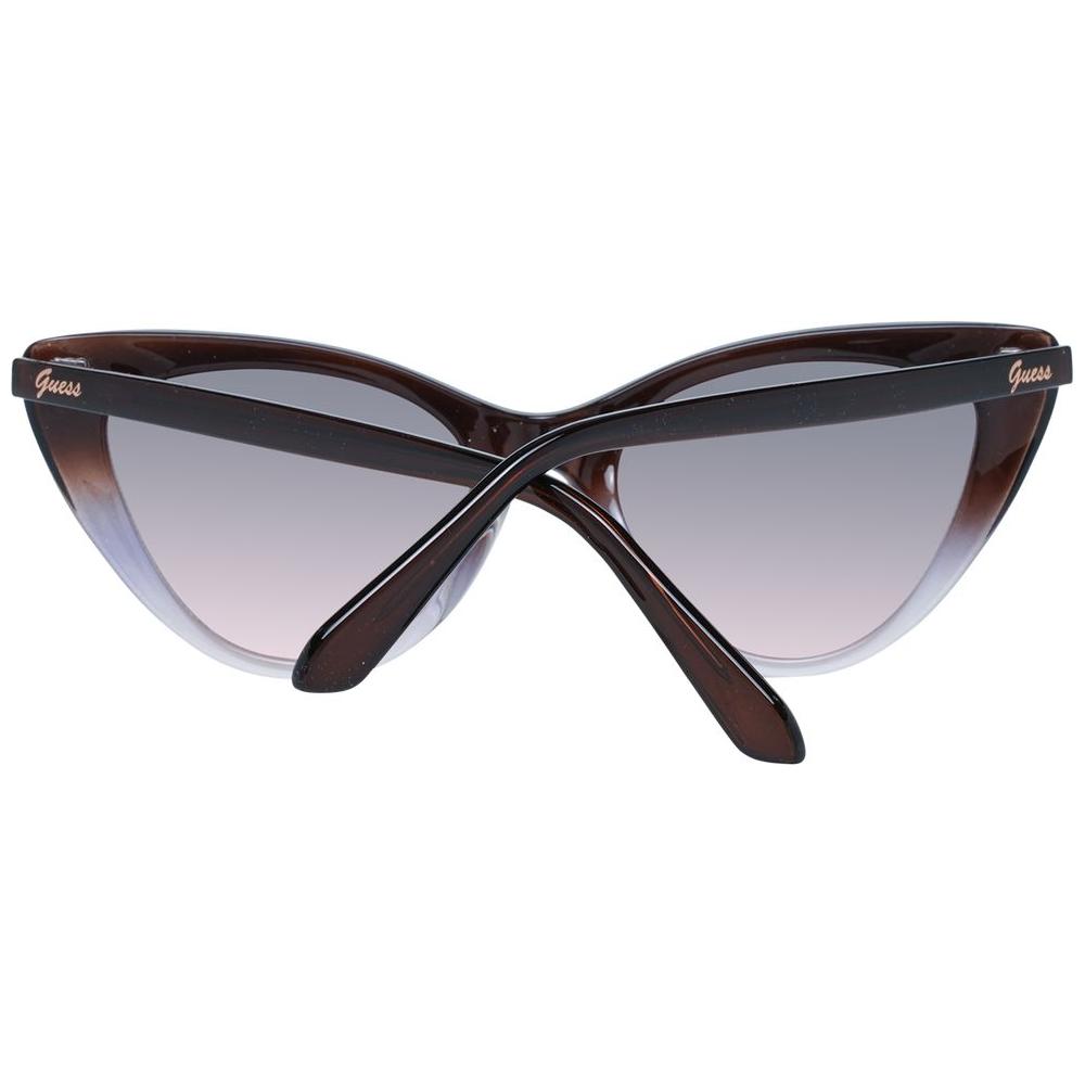 Guess Brown Cat Eye Women's Sunglasses with Gradient Purple Lenses, 100% UVA & UVB Protection, Full-Rim Plastic Frame, Branded Case Included.