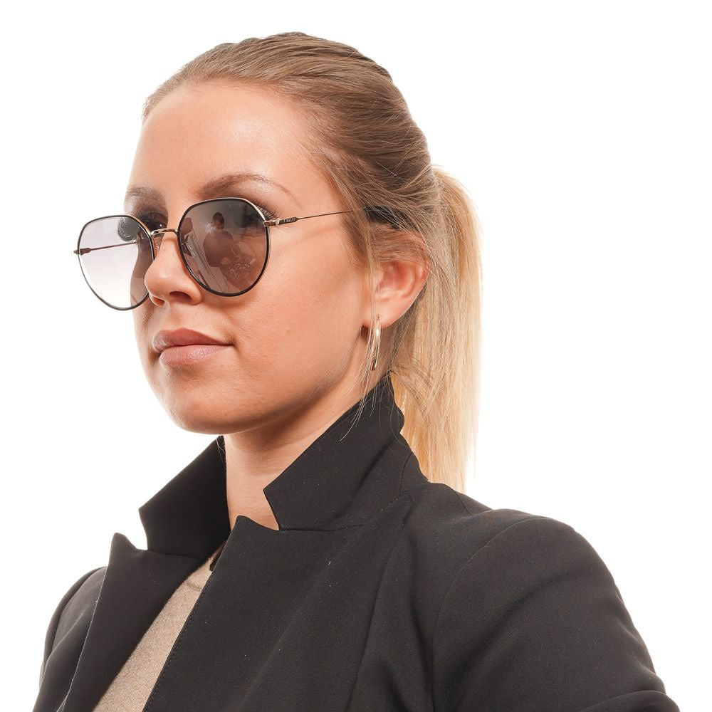 Woman wearing Bally black round sunglasses with mirrored gradient lenses and full-rim metal frame.
