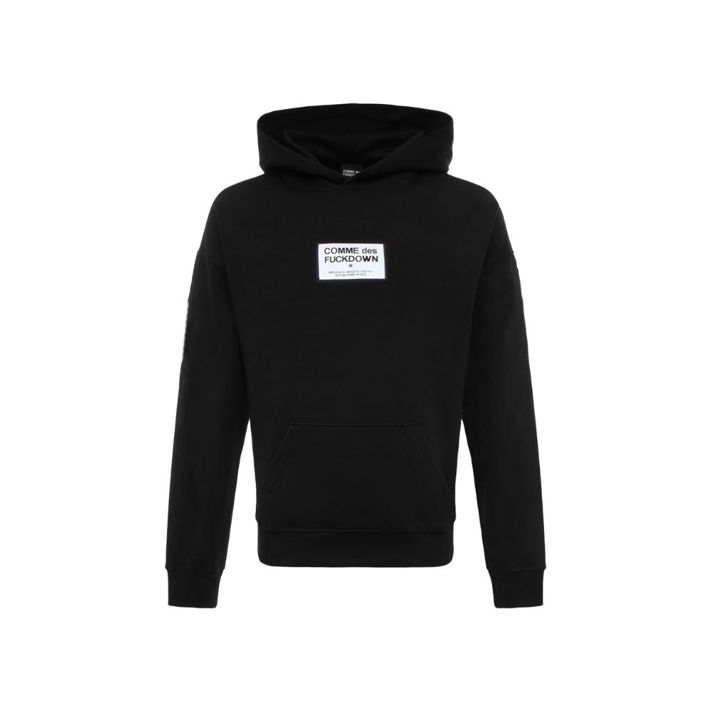Comme Des Fuckdown black cotton sweater with front pocket and logo label on the chest.