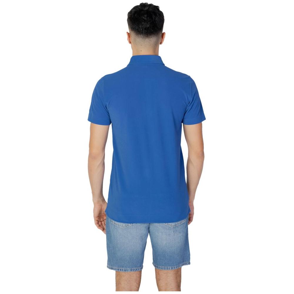 Back view of a men's blue polyester short sleeve polo shirt from the Suns Spring/Summer collection.