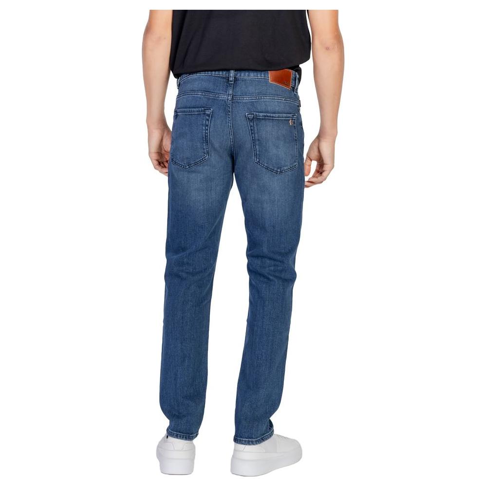 Rear view of Hugo Boss blue cotton jeans, part of the men's fall/winter collection, featuring a blend of cotton, lyocell, and modal.