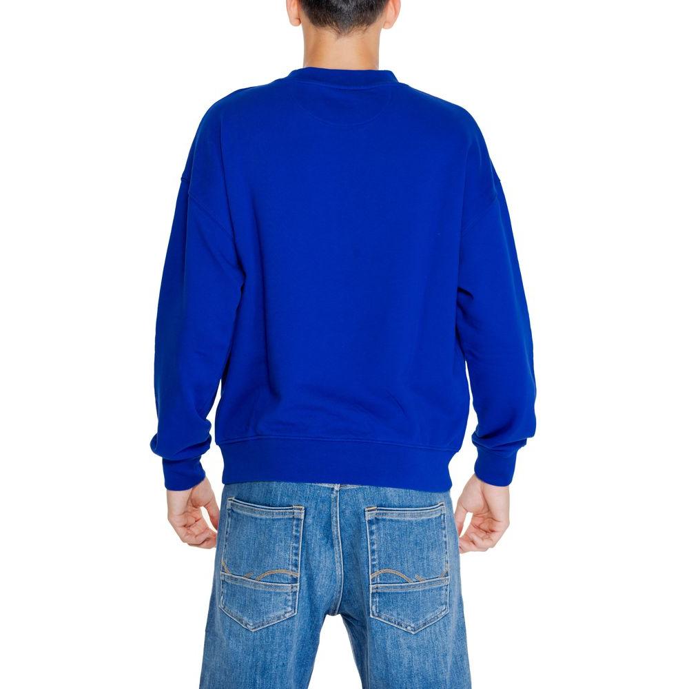 Back view of a man wearing a Replay blue cotton sweater from the Fall/Winter collection.