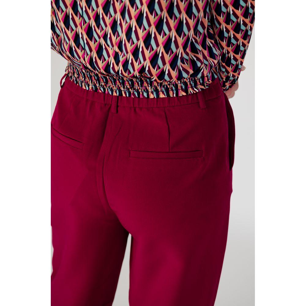 Back view of Vila Clothes Women's Bordeaux Polyester Palazzo Pants for Fall/Winter Collection, featuring vibrant color and style.