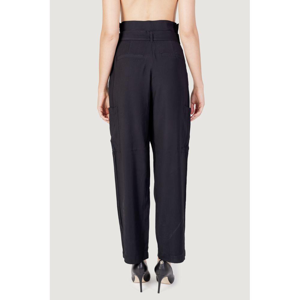 Back view of black Vila Clothes women's viscose jeans and pants, fall/winter collection, composed of 93% viscose and 7% polyester.