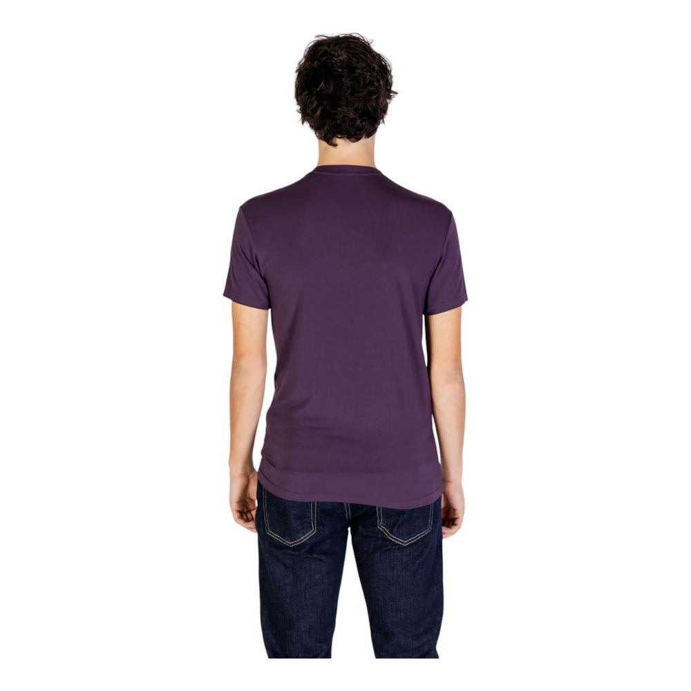 Back view of a man wearing a purple Emporio Armani Underwear modal t-shirt with short sleeves, paired with jeans.