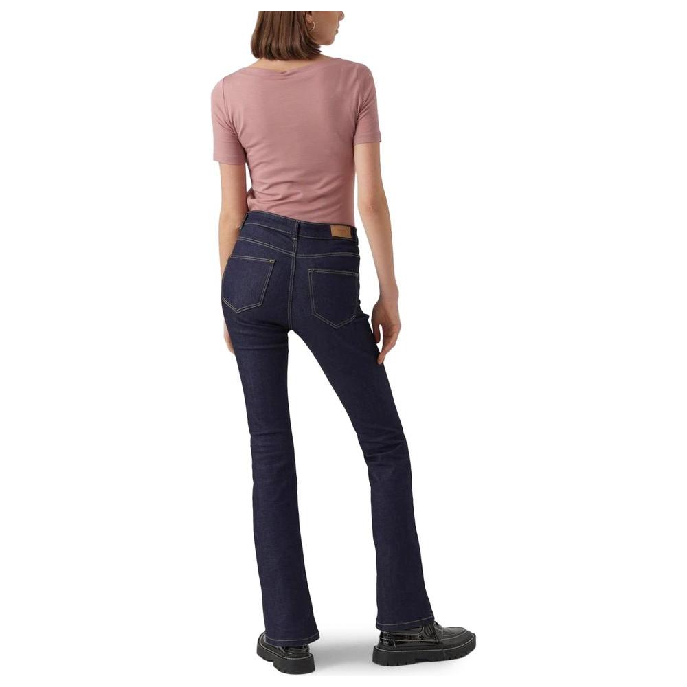 Woman wearing Vero Moda pink viscose short-sleeve top with dark jeans, showcasing a casual yet elegant style from the back view.