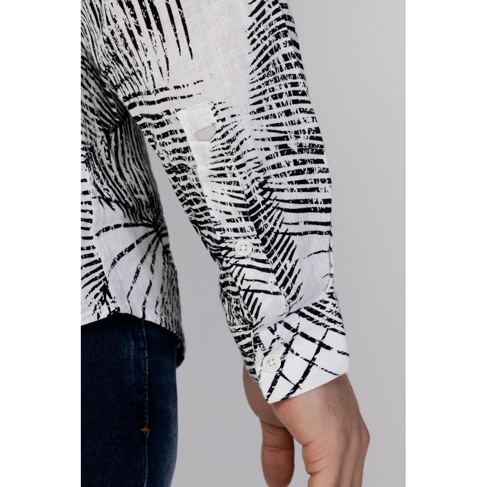 Close-up of Antony Morato black and white patterned long-sleeve linen shirt with buttoned cuff, highlighting slim fit design.