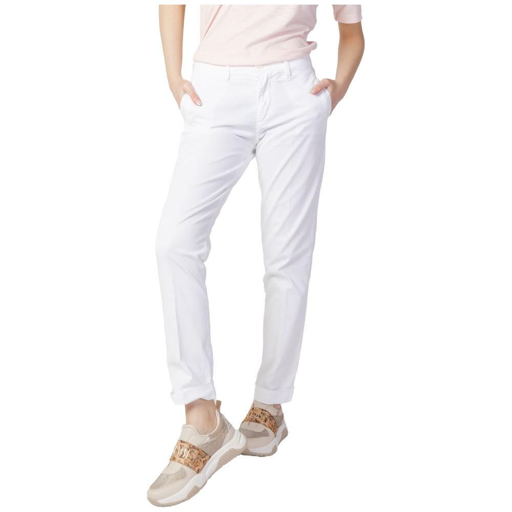 Women's Blauer white cotton cigarette pants, 100% cotton, stylish and comfortable fit, perfect for casual wear, hands in pockets.