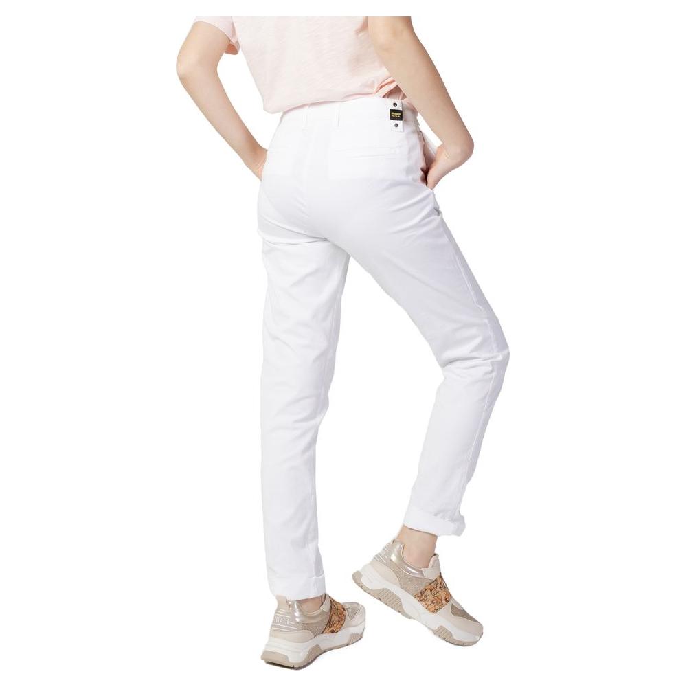 Woman wearing Blauer white cotton jeans, cigarette style, 100% cotton, rear view showcasing modern fit and style.