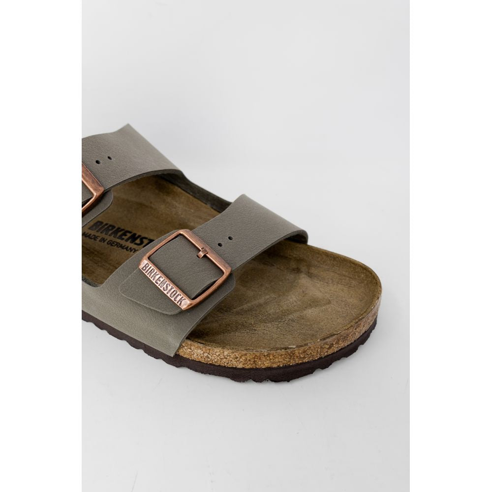 Gray leather Birkenstock women's sandal with copper buckles, part of the spring/summer collection, made from 100% leather.