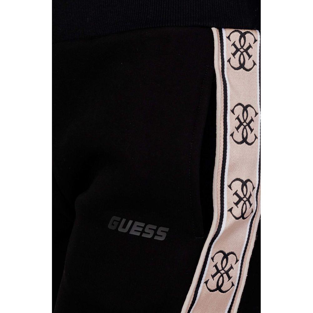 Close-up of Guess Active Britney Jogger in black cotton with patterned side stripe detailing.