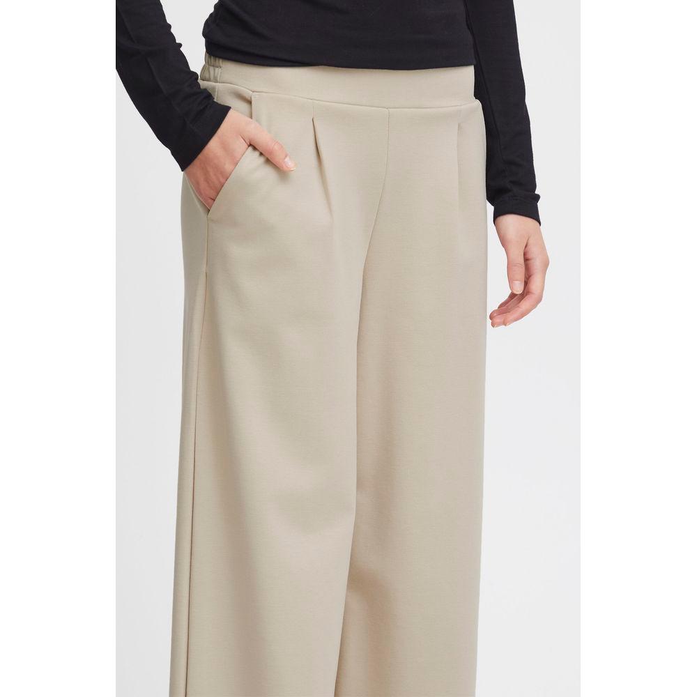 ICHI beige recycled polyurethane women’s pants for fall/winter, featuring regular fit, made of 74% recycled polyester, and pocket detail.