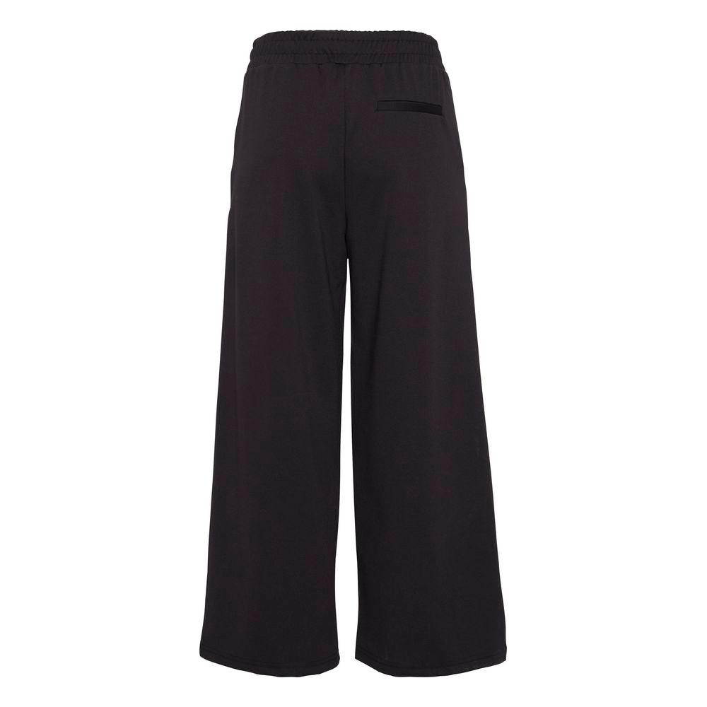 Back view of women's black recycled polyester bootcut pants from ICHI's fall/winter collection.