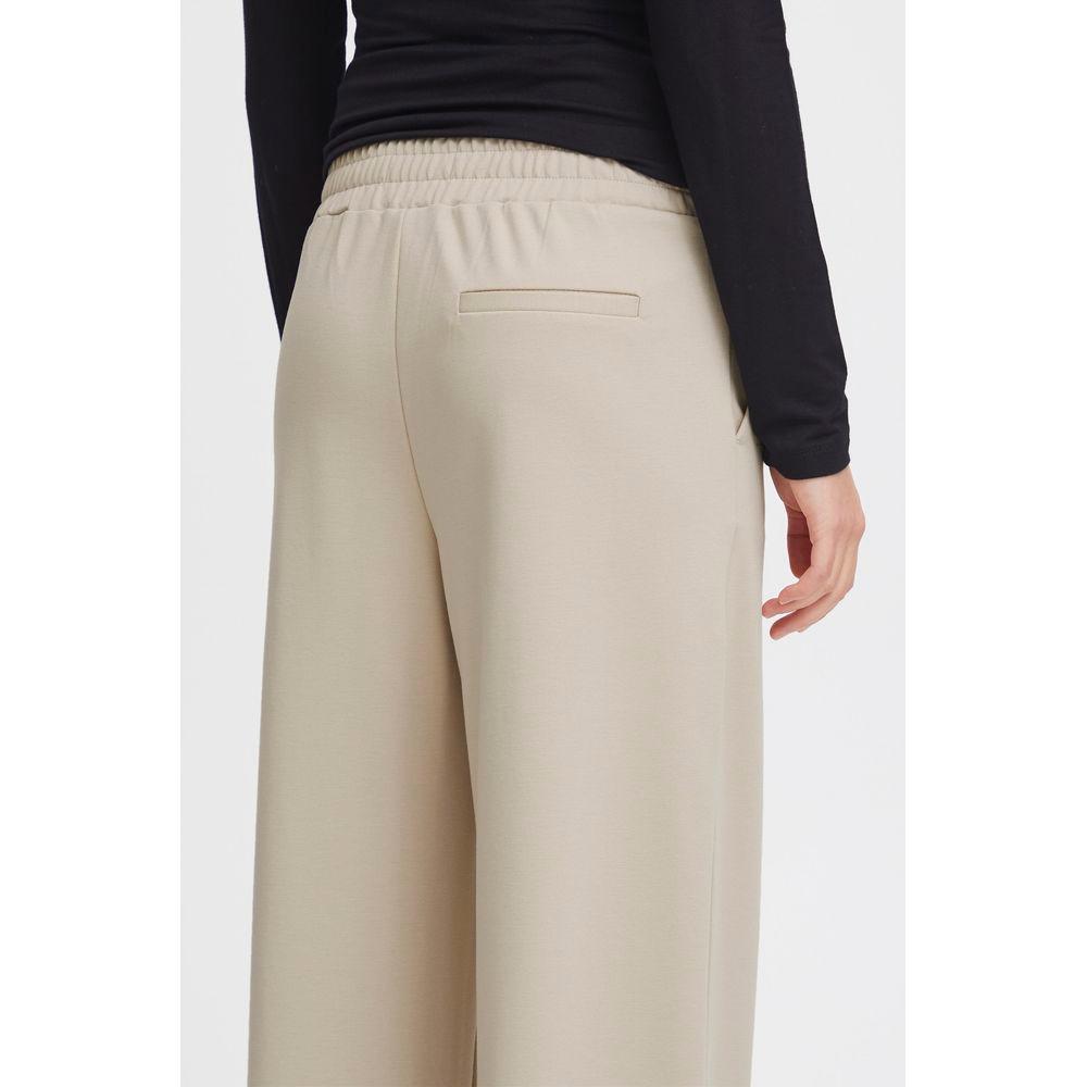 Back view of ICHI Beige Recycled Polyurethane Jeans, women's regular pants for fall/winter, eco-friendly material.