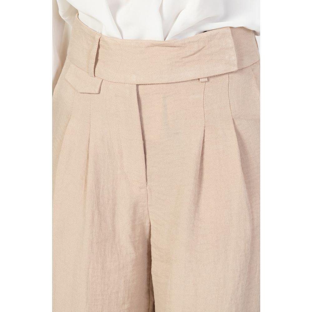 Vero Moda pink palazzo trousers for women - spring/summer collection, made with 81% viscose and 19% nylon, elegant fashion style.
