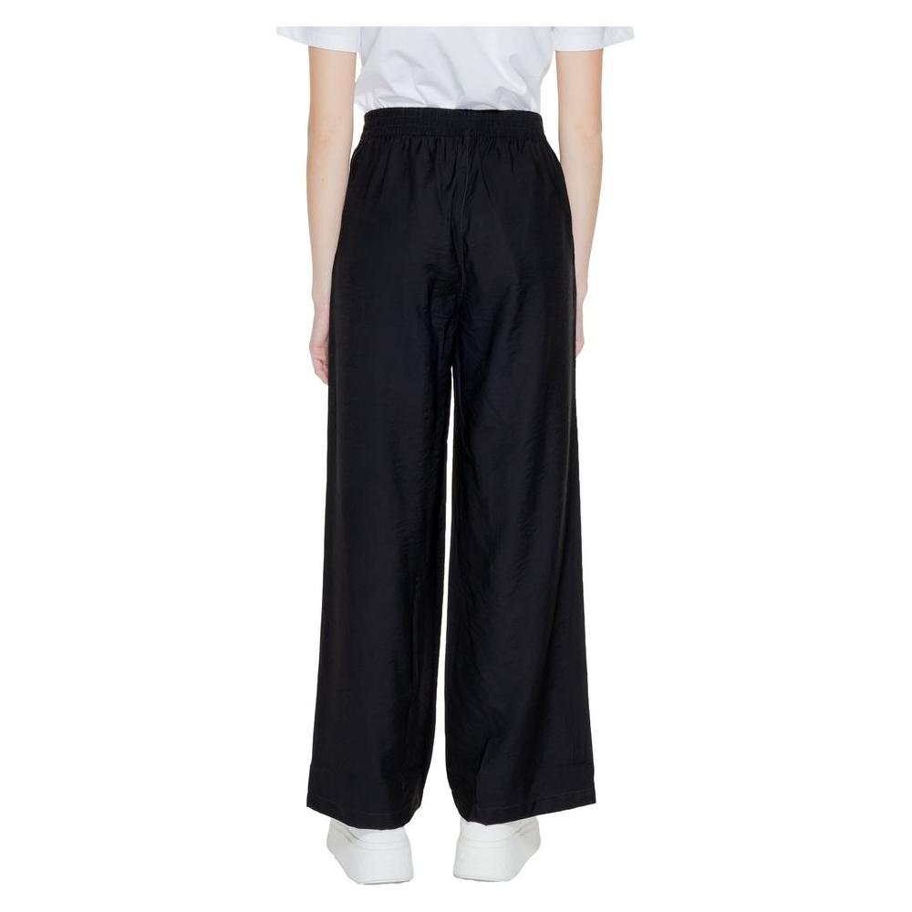 Jacqueline De Yong black viscose palazzo trousers for women, spring/summer collection, back view, 85% viscose, 15% polyamide.