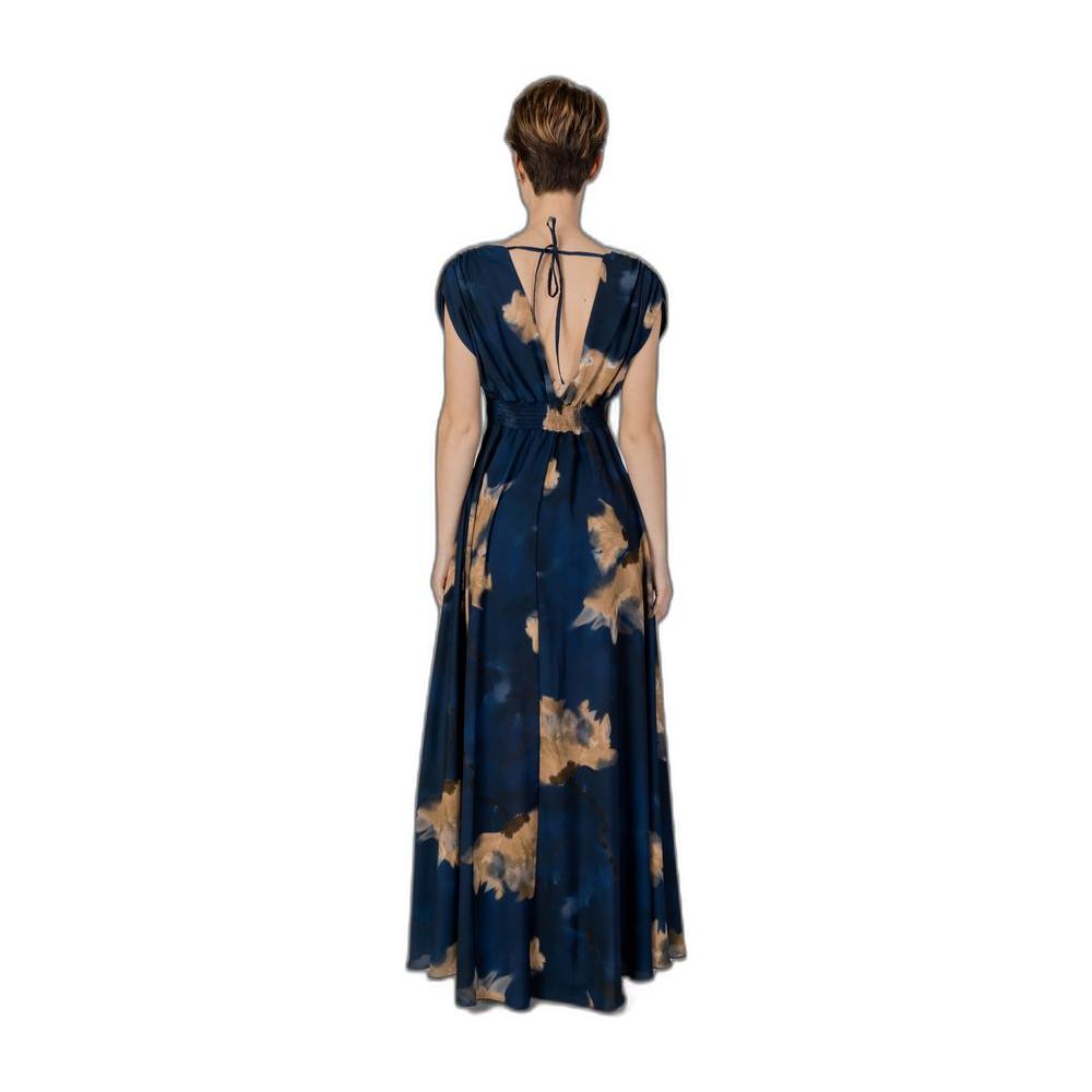 Back view of Rinascimento blue polyester long dress for women, spring/summer collection, featuring an elegant floral pattern.