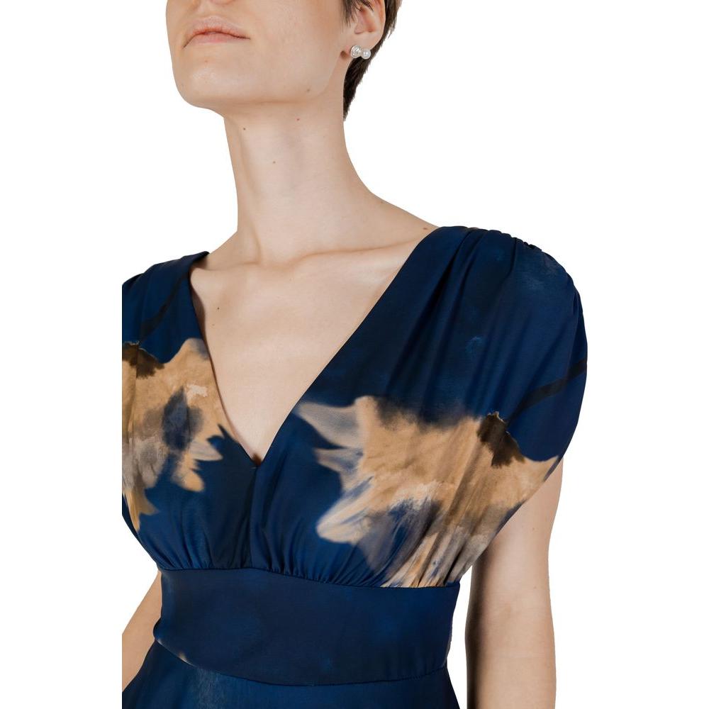 Rinascimento blue long polyester dress from the Spring/Summer collection, featuring a deep V-neckline and artistic floral patterns.