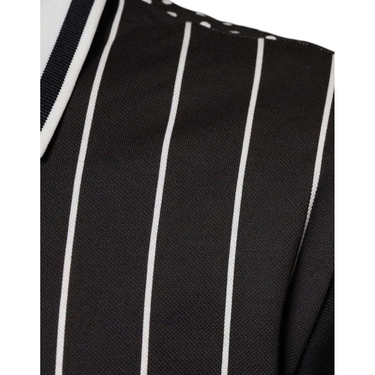 Dolce & Gabbana black and white striped collared polo shirt with button closure, made of 100% cotton, featuring logo details.