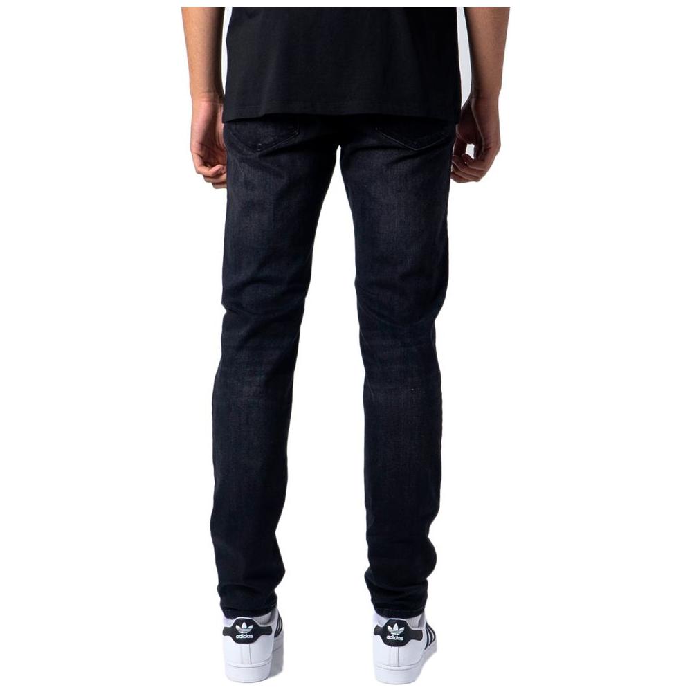 Back view of Jack Jones black slim fit cotton jeans for men, showcasing comfortable and versatile design.