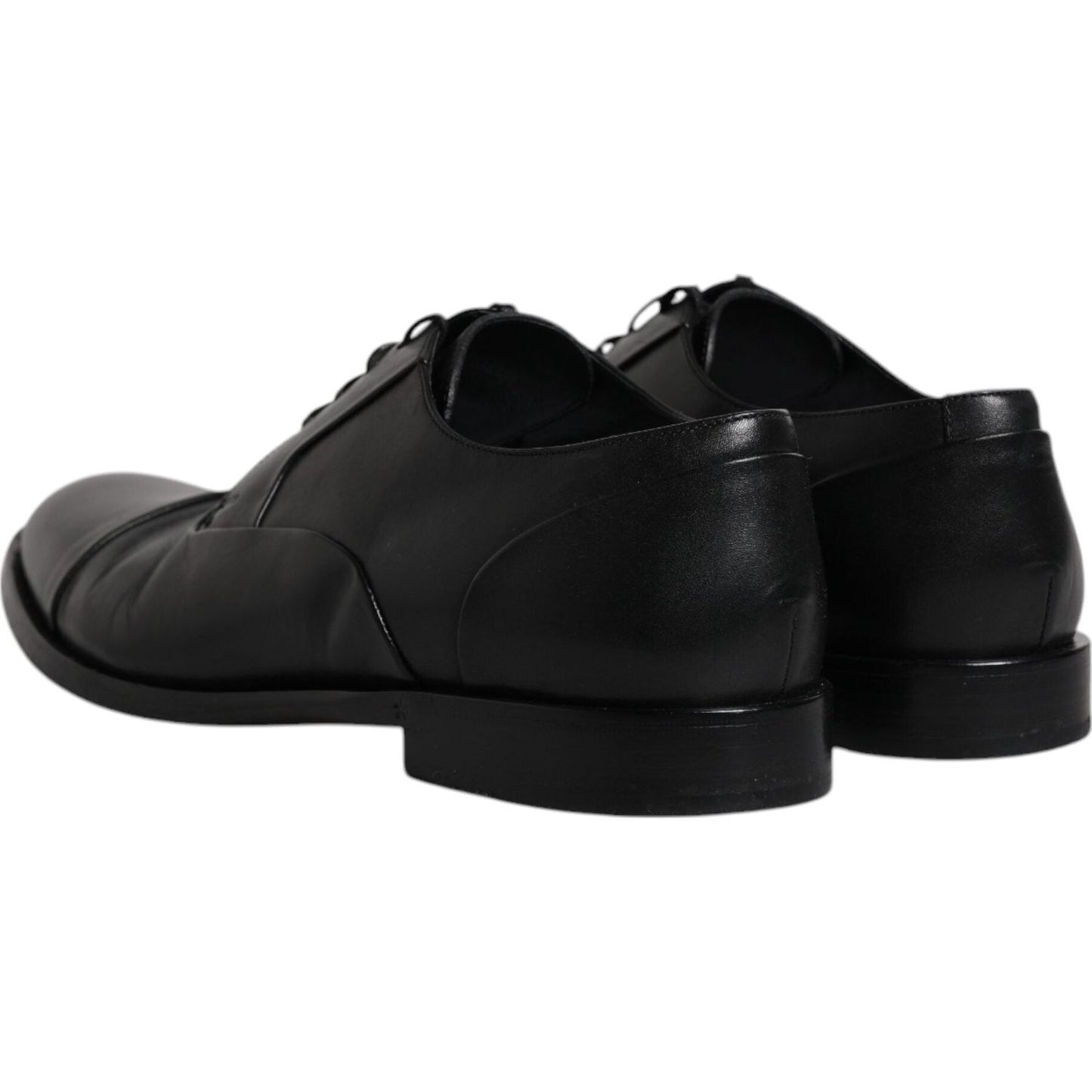 Back view of Dolce & Gabbana black leather lace-up men's derby formal shoes with logo detail, featuring high craftsmanship and leather sole.