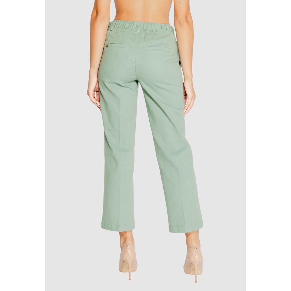 Back view of Street One turquoise women's fall/winter cotton jeans with elastic waistband, showcasing modern design and comfort fit.