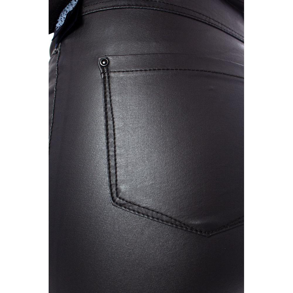 Close-up of black viscose jeans showcasing the rock coated finish and high waist design for a sleek and slimming look.