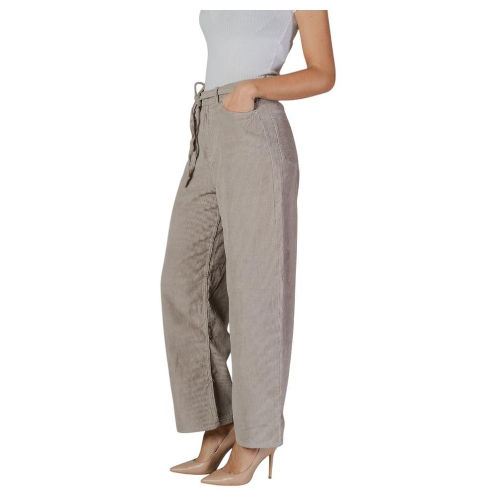 Women's only beige cotton baggy pants from the fall/winter collection, featuring a jogger style with a comfortable fit.