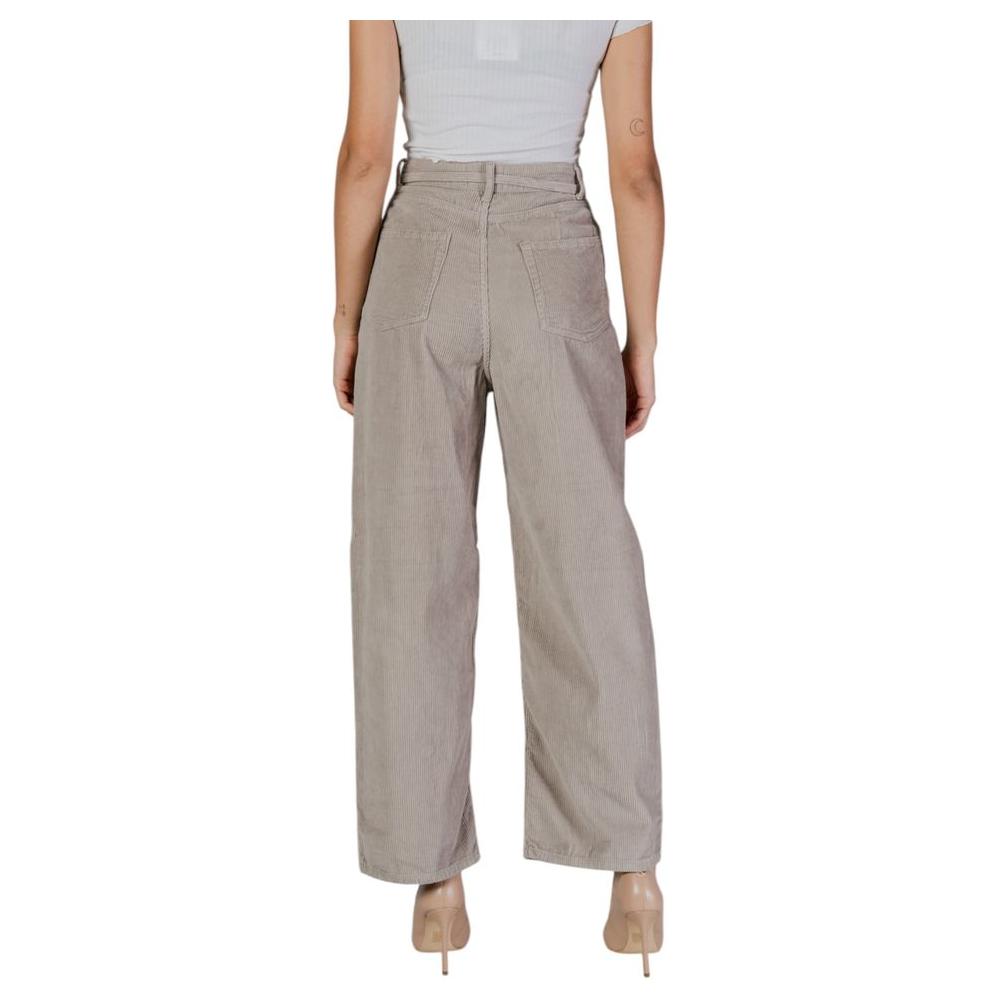 Women's beige cotton baggy pants from fall/winter collection, featuring a high waist and wide leg fit, made of 100% cotton.