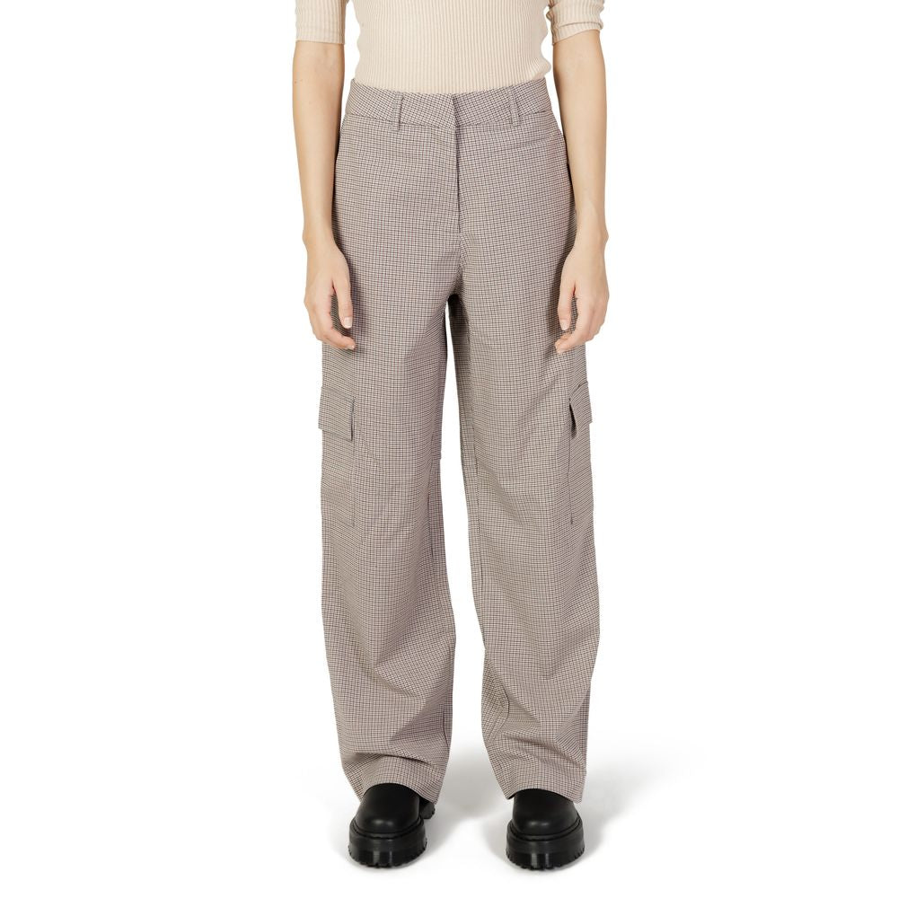 Women's beige polyester cigarette pants, Autumn/Winter collection, featuring a blend of polyester, viscose, and elastane.