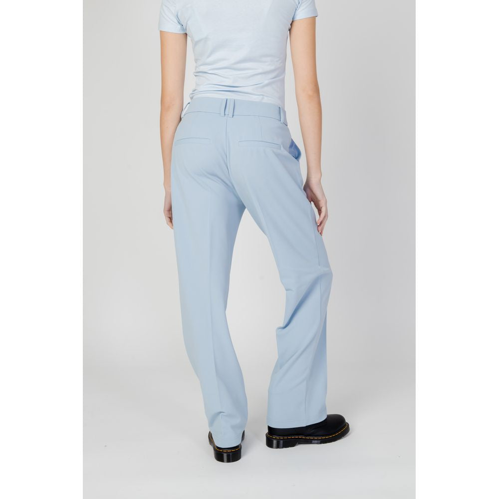 Women's blue cigarette pants, spring/summer collection, 98% polyester, 2% elastane, back view, perfect for stylish comfort.