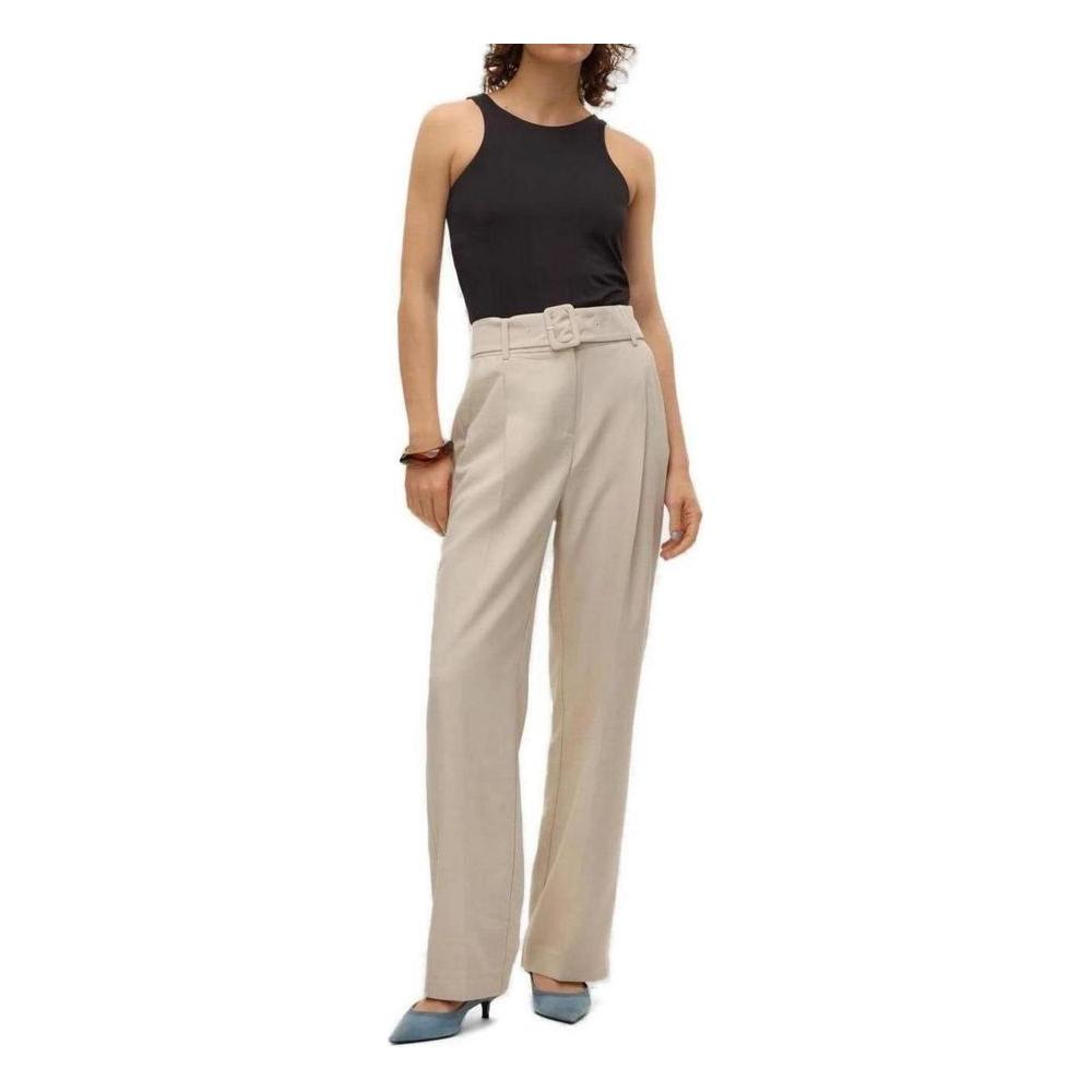 Woman modeling Vero Moda gray polyester trousers, featuring a high waist and belt, perfect for spring or summer fashion.