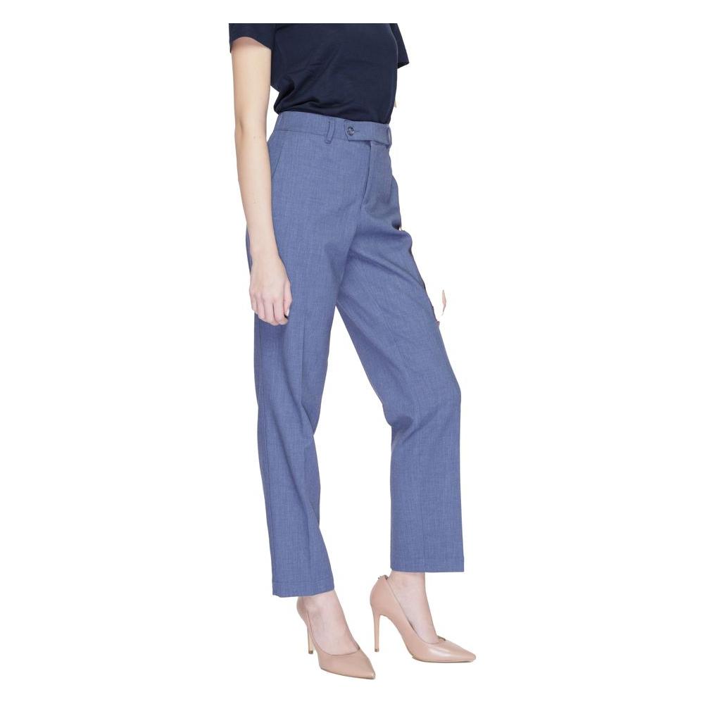 Street One blue women's cigarette pants, spring-summer collection, polyester, viscose, and elastane blend, side view.