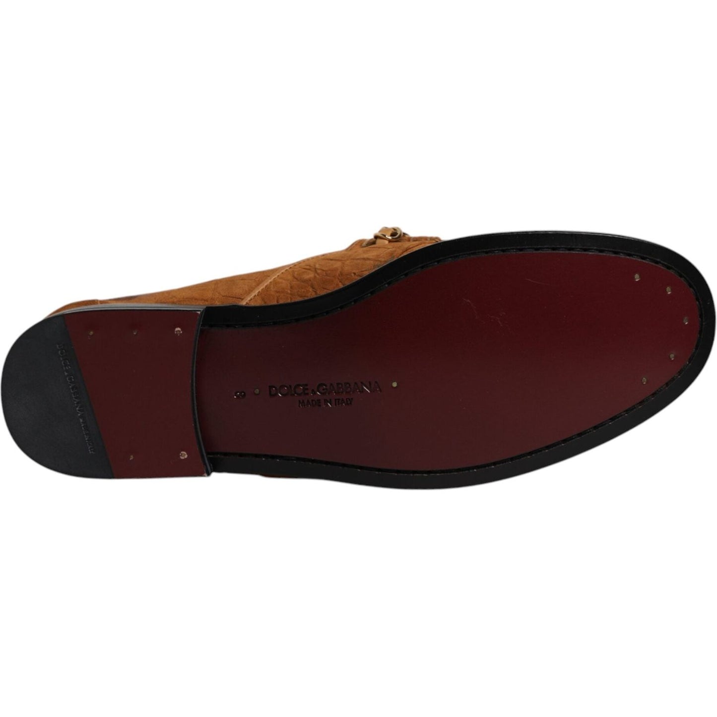 Sole view of Dolce & Gabbana brown suede leather loafers showing brand logo, Italian craftsmanship, minor glue marks visible.